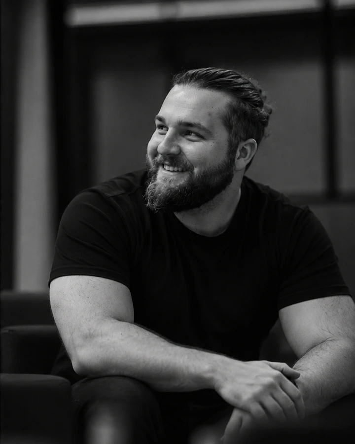 Ben Verrell seated in conversation.